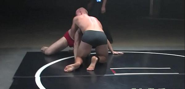  Oiled wrestling hunks fight before anal sex